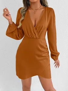 Elegant copper satin mini dress with deep V-neck, wrap front, and long bishop sleeves.
