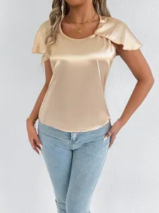 Elegant champagne gold satin blouse with flutter sleeves and high-gloss texture