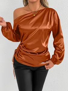 Elegant brown satin long sleeve off-the-shoulder blouse with a drawstring detail