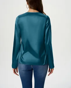 Back view of elegant teal long-sleeved satin blouse for women showing silky smooth texture