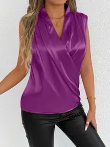 Close-up of elegant purple sleeveless satin blouse with draped V-neck design