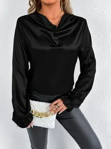 Elegant black satin cowl neck blouse detail with shiny finish and ruffled cuffs