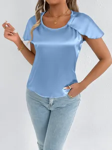 Detail of light blue satin short sleeve t-shirt with elegant ruffle sleeves