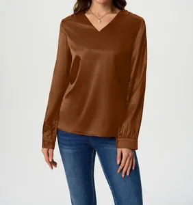 Elegant brown satin long-sleeved V-neck blouse showing smooth fabric texture and fit