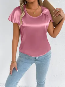 Detailed view of an elegant pink satin short-sleeved blouse with a smooth glossy finish