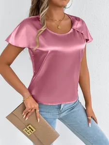 Detail of a premium pink satin short-sleeved blouse for women featuring a smooth silk-like sheen