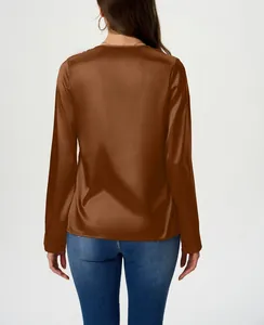 Detailed back view of an elegant brown satin long-sleeved blouse with a silky lustrous finish