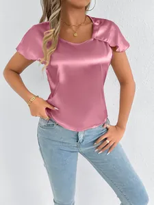 Close-up detail of a pink satin short sleeve t-shirt for women with a silk-like finish