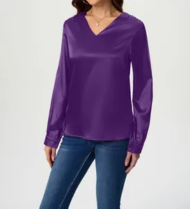 Close-up detail of an elegant purple V-neck long-sleeve satin blouse with shimmering texture.