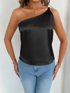 Detailed view of a black satin one-shoulder tank top showing fabric sheen and fit