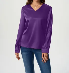 Close-up of elegant purple satin blouse with a deep V-neckline and smooth texture