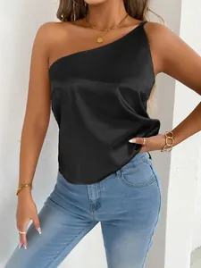 Close-up detail of black one-shoulder satin camisole showing silky fabric texture and fit