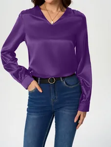 Detailed view of elegant purple long-sleeve satin blouse with V-neck design