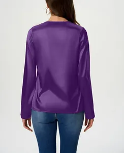 Back view of a purple long-sleeved satin blouse for women with a silky finish