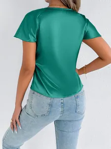 Back view of a women's elegant green satin short sleeve top showing smooth fabric texture.