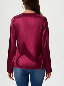 Back view of elegant women's burgundy satin long sleeve blouse featuring silk-like sheen