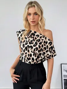 Detailed view of stylish women's leopard print one-shoulder satin shirt for summer