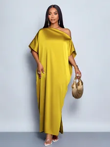 Elegant yellow satin long dress with one-shoulder design for women's evening party wear.