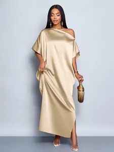 Detail showing champagne gold satin maxi dress with off-shoulder design for formal events