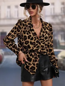 Close-up showing the silky texture of a leopard print long sleeve shirt for women.