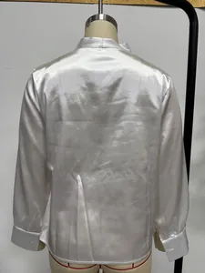 Detailed back view of an elegant glossy white satin long-sleeve blouse for women