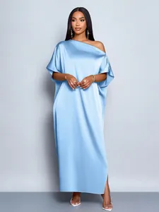 Detail view of the light blue satin one-shoulder maxi dress with a smooth texture