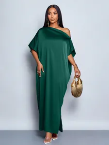 Elegant dark green satin one-shoulder maxi dress with draped silhouette for women.