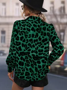 Detailed back view of a chic green leopard print satin blouse featuring long sleeves
