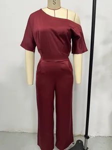 Detail of elegant wine red asymmetric one-shoulder satin jumpsuit for women