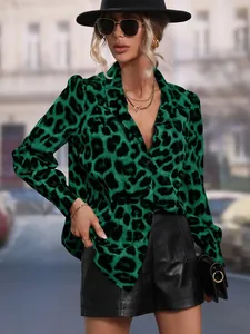 Detail view of the green leopard print satin shirt featuring a classic button-down collar