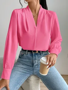 Elegant hot pink satin long sleeve blouse with a relaxed V-neck design for women