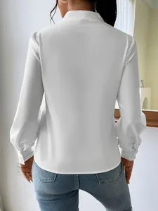 Back view of an elegant white satin long sleeve blouse for women with silky texture.