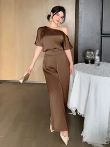 Elegant chocolate brown satin jumpsuit with asymmetric shoulder and wide leg fit