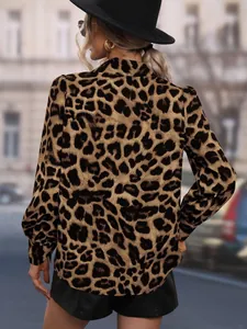 Back view of a stylish leopard print satin long sleeve blouse featuring a classic collar design
