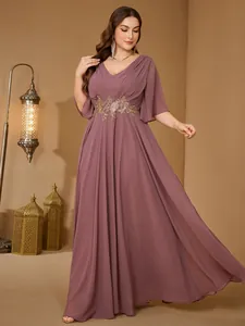 Elegant mauve plus size V-neck evening gown with gold floral waist embroidery detail.