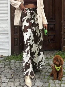 Women's satin midi skirt with cow print pattern and high waist for spring style