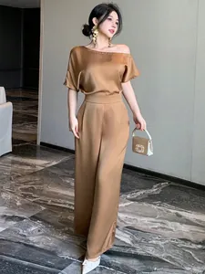 Elegant bronze satin one-shoulder jumpsuit with wide-leg design for women.