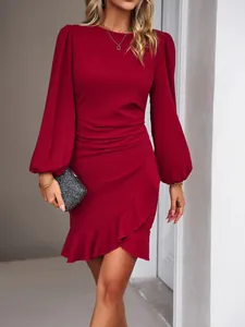 Elegant dark red long-sleeved bodycon mini dress featuring a ruffled fishtail hem and puff sleeves