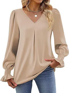 Detailed close-up of a khaki satin blouse featuring V-neck and elegant ruffled bell sleeves