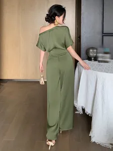 Elegant olive green satin one-shoulder jumpsuit with wide leg design, back view detail