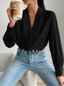 Elegant women's black satin blouse featuring a V-neck and long sleeves, casual style.