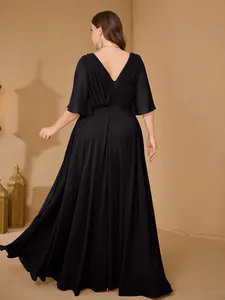 Detailed back view of elegant plus size black maxi dress with V-neck and ruffle sleeves.