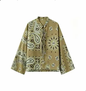 Vintage paisley print long sleeve shirt with tie-front detail on a white background