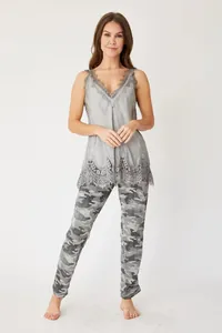 Detailed view of women's grey lace trim camisole and camouflage print loungewear set