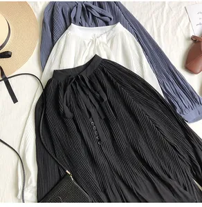 Detail view of retro pleated chiffon blouses with lace-up V-neck in three colors