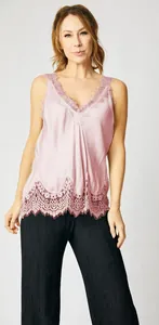 Close-up detail of women's pink lace camisole top with elegant V-neckline design