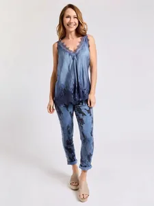 Elegant blue lace patchwork camisole top with matching patterned trousers for women