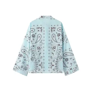 Back view detail showing light blue paisley print on a loose-fit summer shirt for women