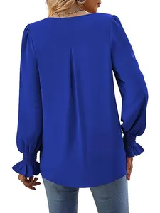 Royal blue satin long sleeve blouse with pleated back and ruffled cuffs