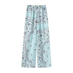 Detailed macro view of stylish light blue paisley print wide leg trousers for women